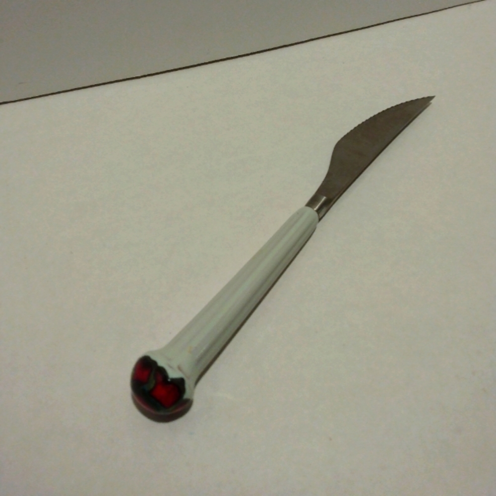 1 vintage Denby steak knife.